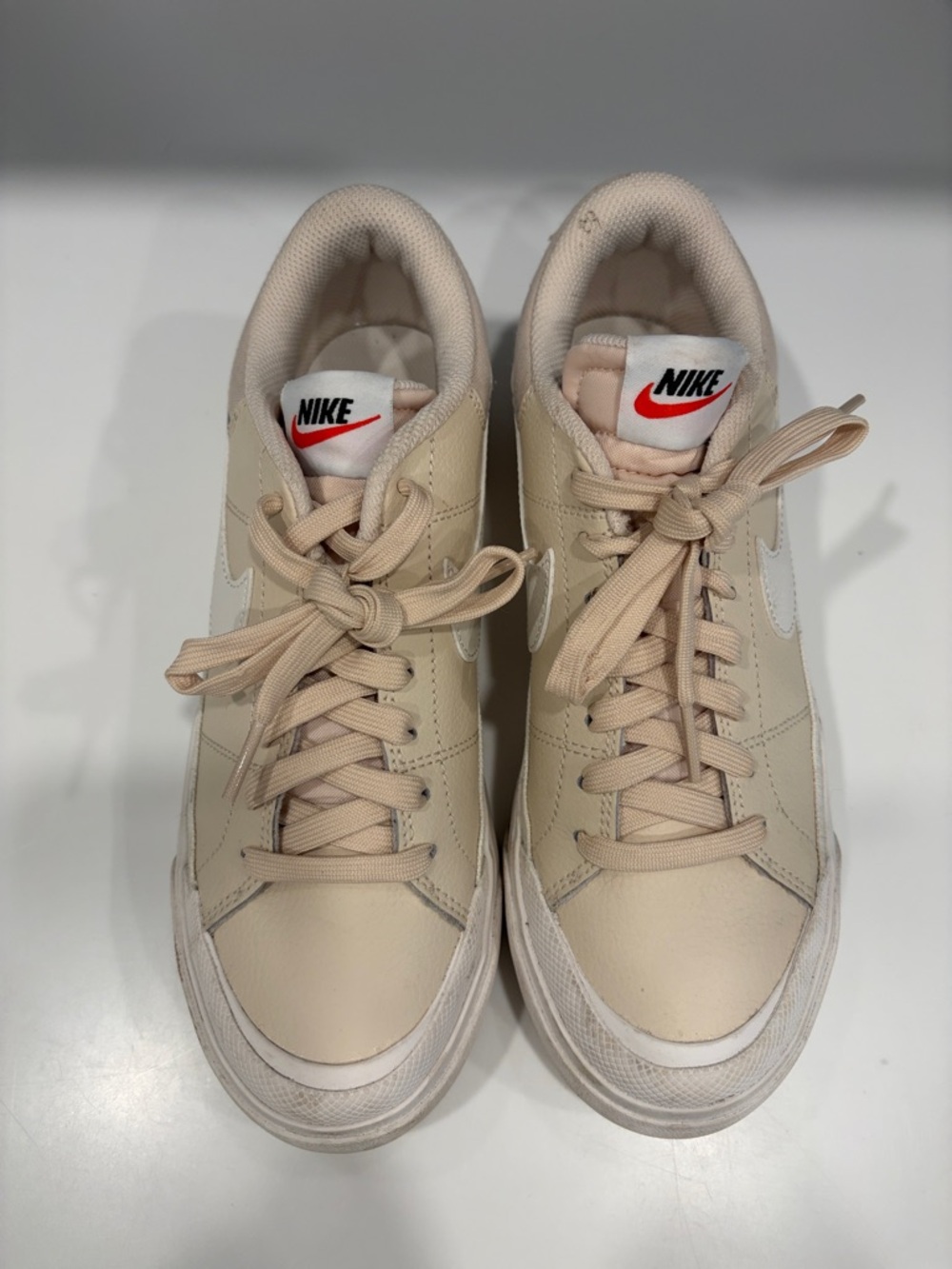 Nike Cream/Tan Low-Top Sneakers with White Swoosh